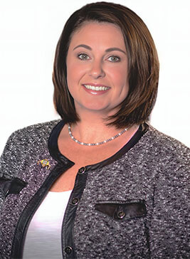 A photograph of Sara Walker, Contracts Manager of PCI Productions LLC